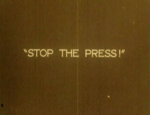 An intertitle from The Power of the Press