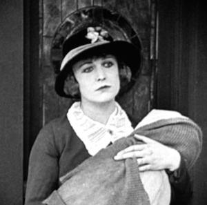 Edna Purviance in The Kid