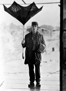 Buster Keaton prepares for the London weather