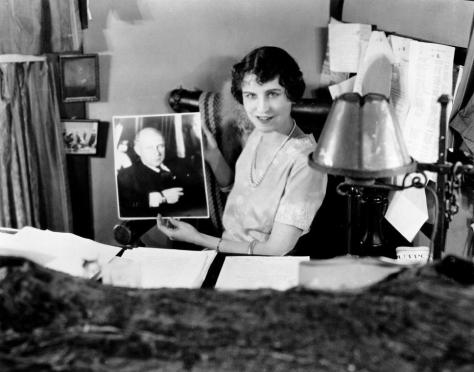 Jeanie Macpherson with a photograph of Cecil B DeMIlle